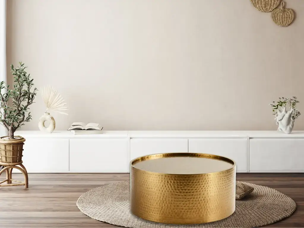 The Hudson Hammond barrel coffee table in brass